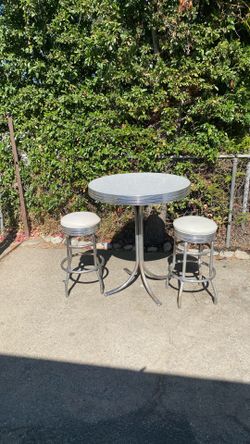 Gorgeous set three pieces two barstools and matching table  good condition overall beautiful style comfortable stools nice color Table H41” round 35.5