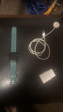 Apple Watch with Teal Sport Band and Charger
