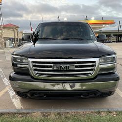 99-06 GMC Sierra Headlights