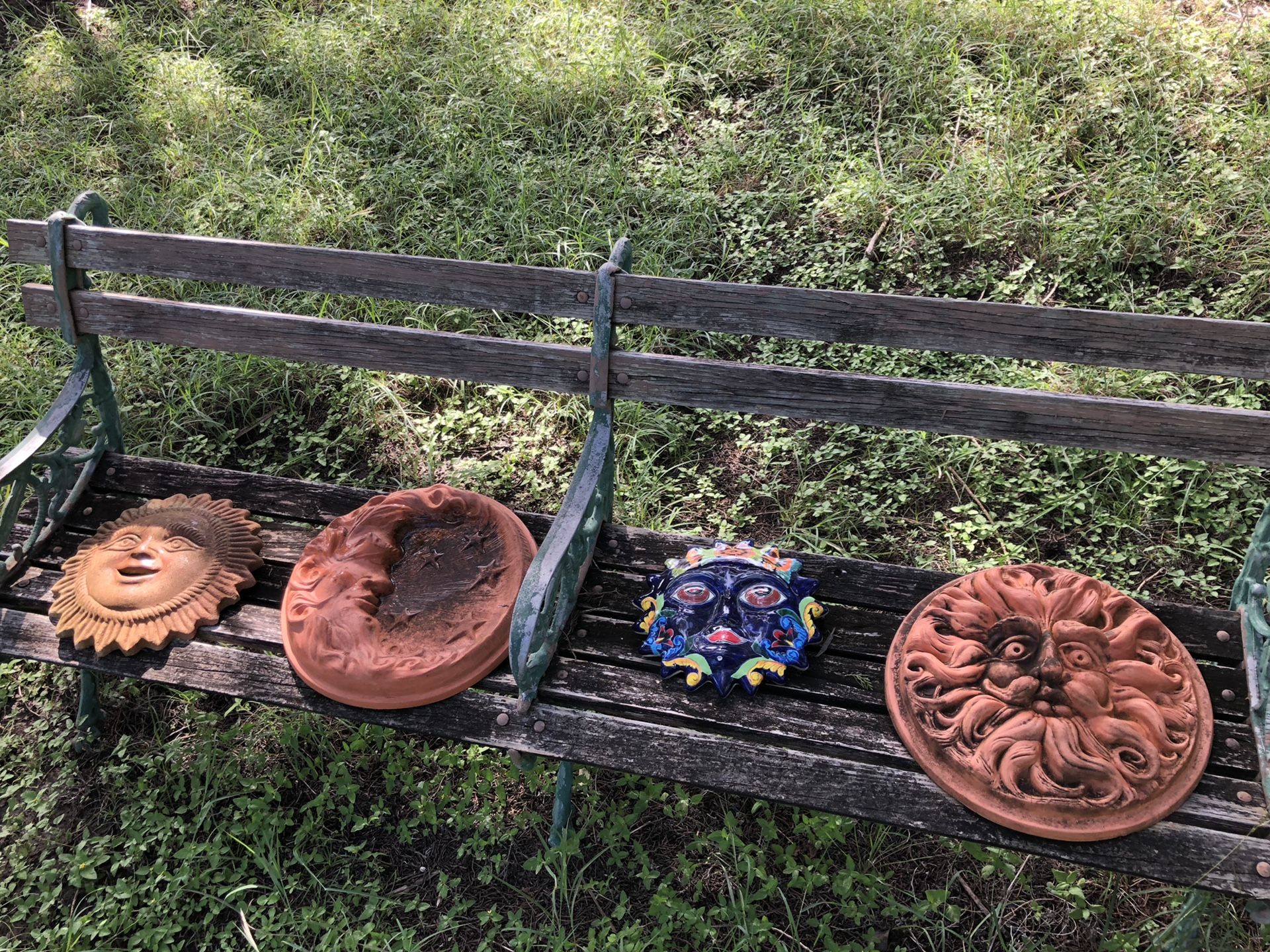 Four garden plaques.