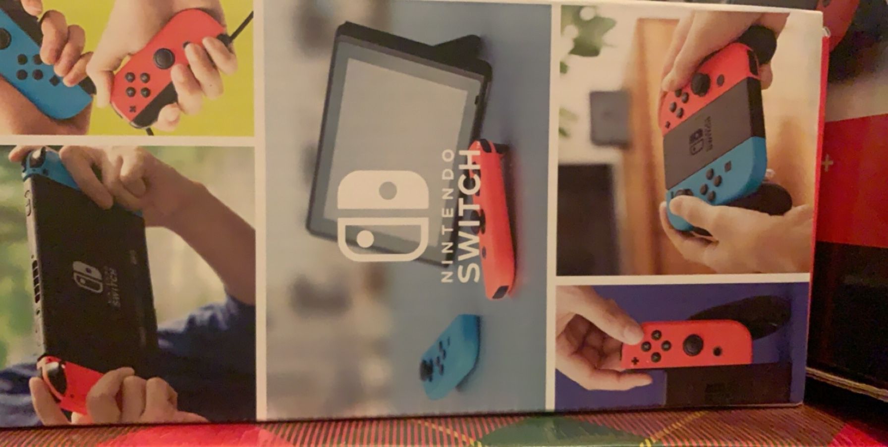 Nintendo Switch + Charging Case