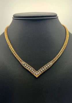 14k yellow gold Chevron necklace chain 17" 7.5mm wide. Approximately 1.20 CTW