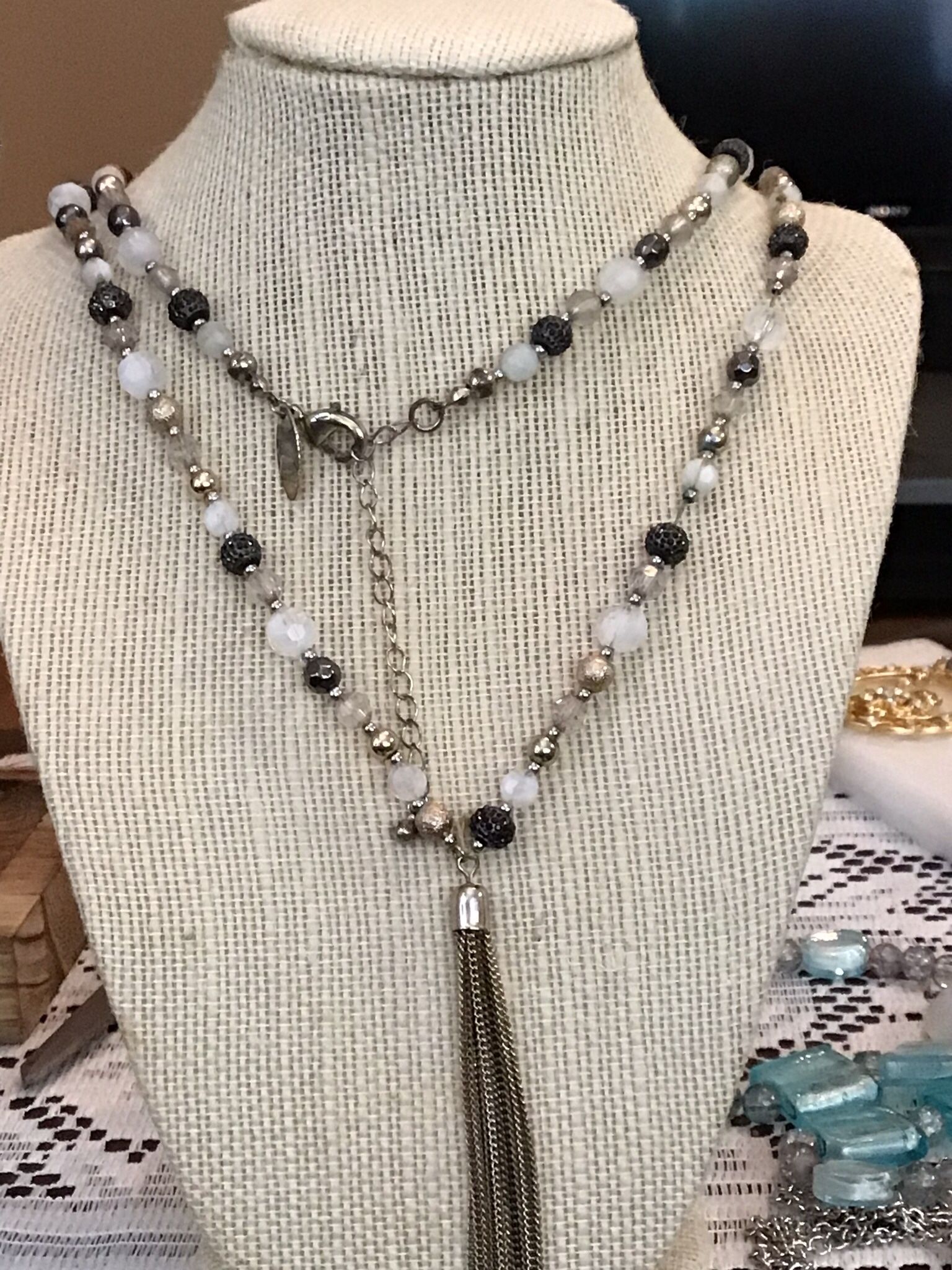 New York ladies this is for you a beautiful black white and beige beaded necklace Tag says NY