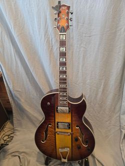 Hollow body guitar by IYV