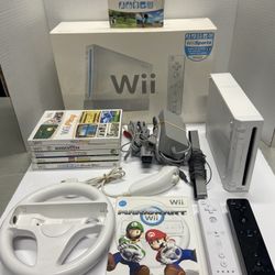 Nintendo Wii With Games For Sale $140. OBO. Tested. (Comes with Wii Box.)