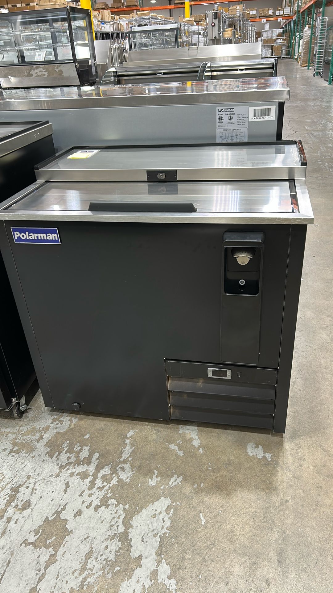 Polarman PLM-B50A 49 7/16" Top Loading Bottle Cooler with 2 Sliding Lids & Bottle Opener, Black Exterior