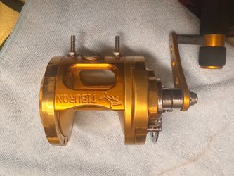 Custom PENN International T12H Fishing Reel W/ Gold Tiburon Frame Upgrade.