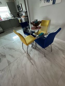 Glass table with chairs