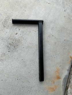 Wrecker wheel lift arm