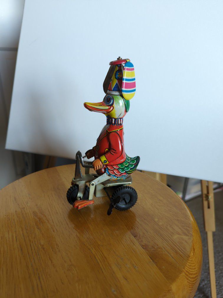 Vintage LITHO TIN Duck On Bike Wind Up Toy