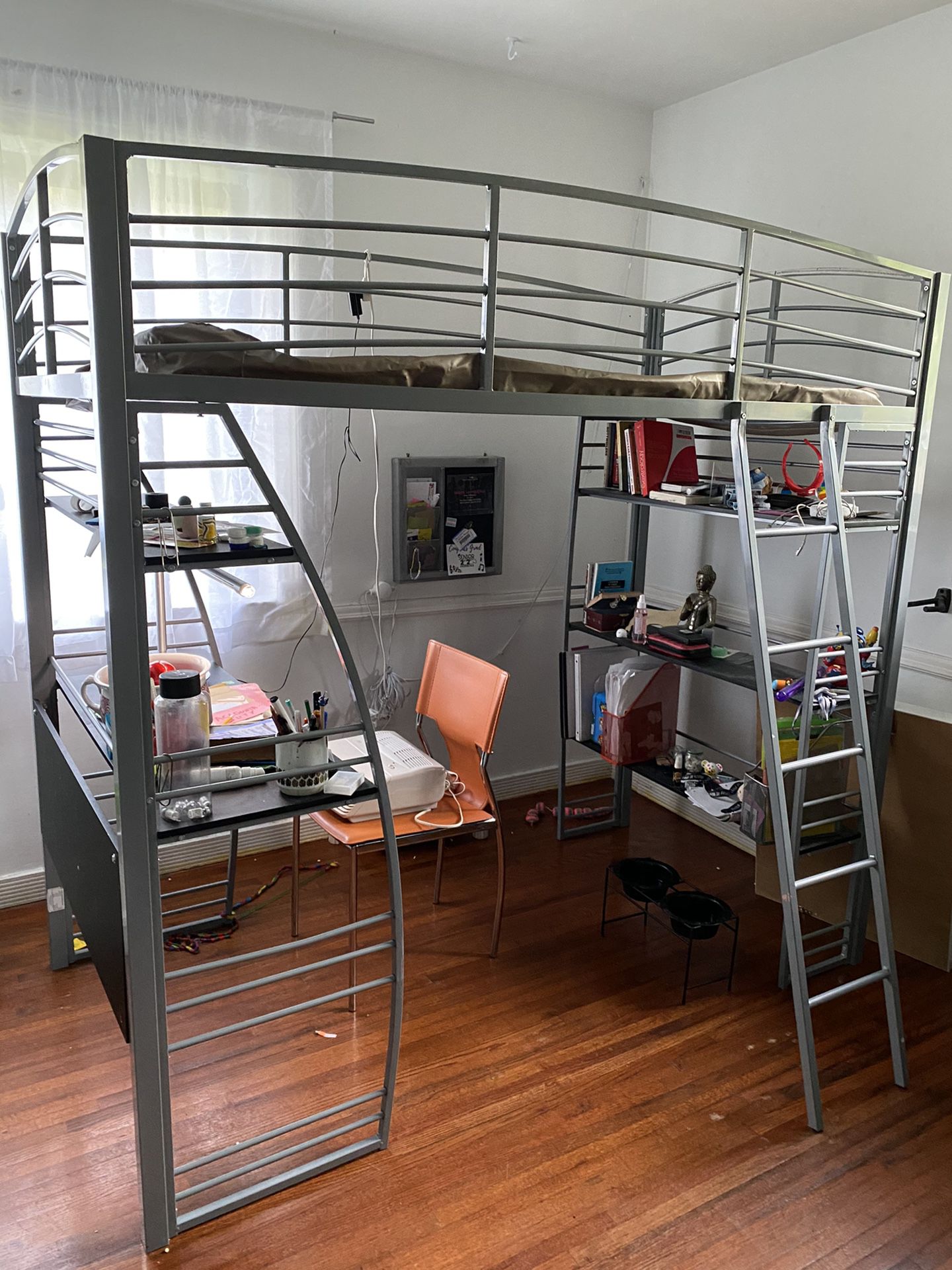 Modern bunk bed with desk and bookshelves