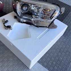 Set of stock 2018 tacoma headlights