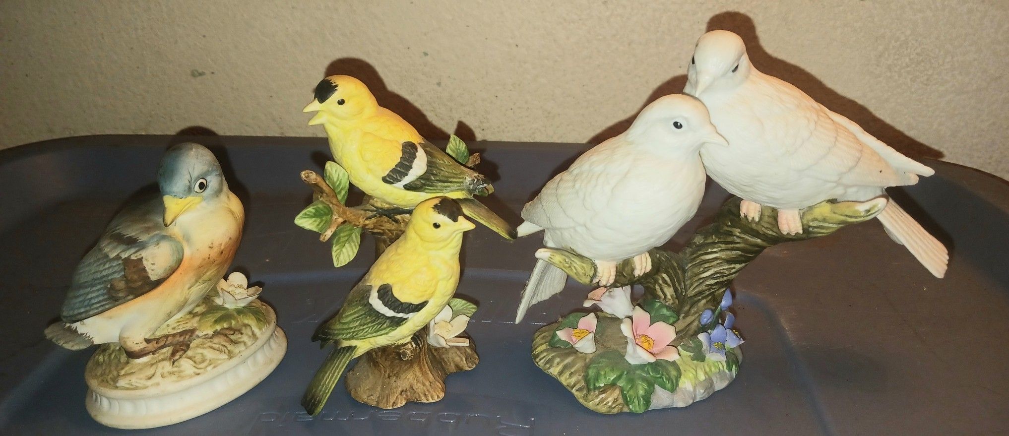 collection of Three vintage ceramic or porcelain bird figurines