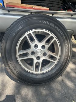2004 Jeop Grand Cherokee wheels and new tires tires -set of 3