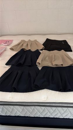 Uniforms skirts size 10. Izod brand