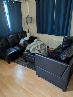 Free black leather sectional and ottoman