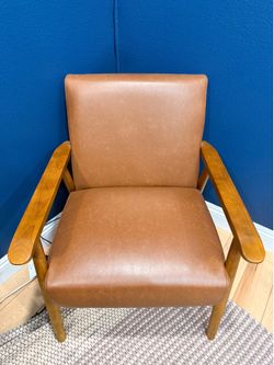 Mid century modern faux leather chair