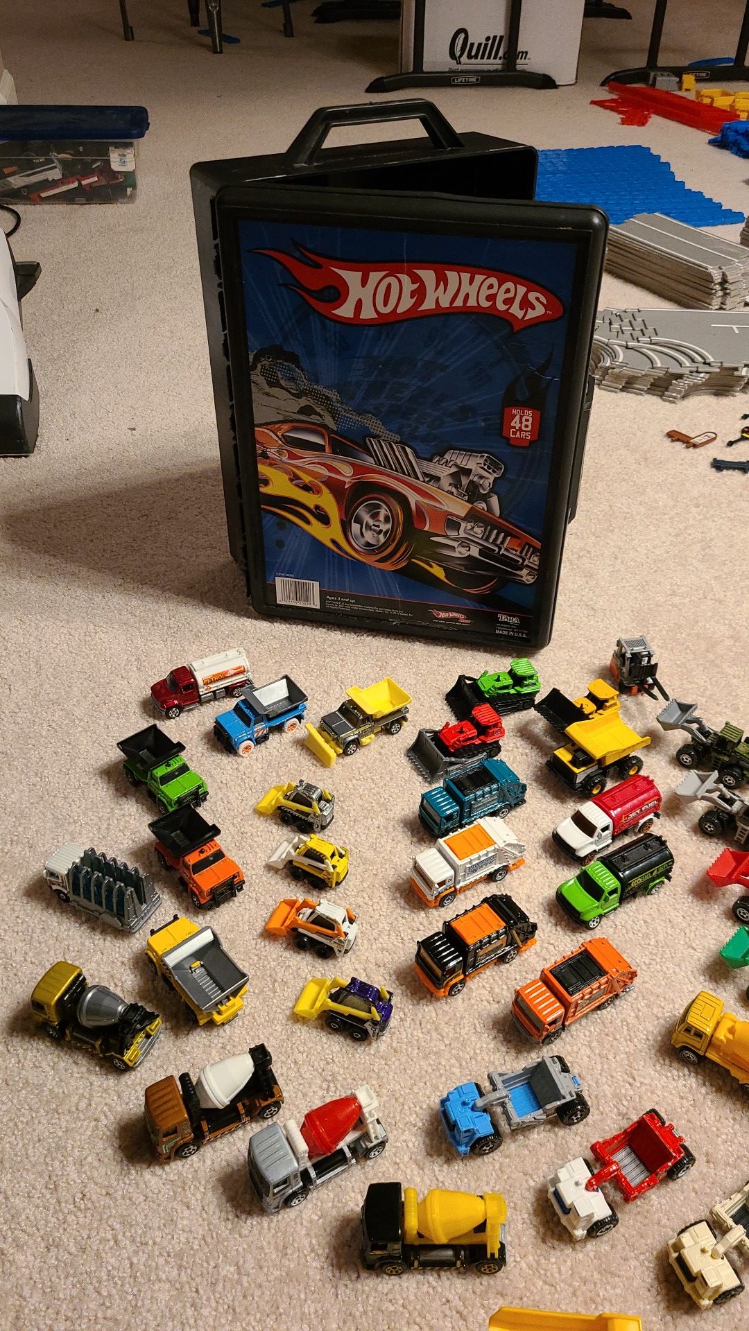 Hot Wheels case with 43 construction toy vehicles