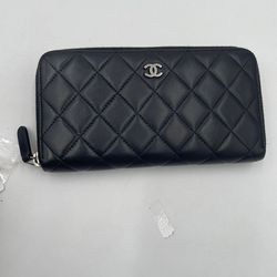 Authentic Chanel zip wallet in black with card