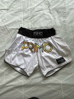 Primo Premium White Muay Thai Shorts with Gold Refractor Graphics