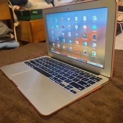 Excellent 11 inch Apple Macbook Air Laptop Computer With Intel Core i5 Processor With Programs 