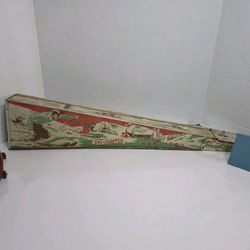 Wolverine Ski Jumper, Tin Litho,  Spring-Activated Toy, With Skiier