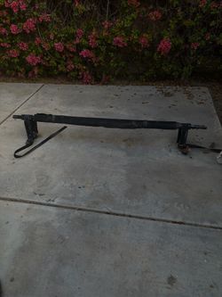Truck bed cargo unloader