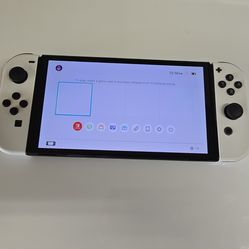 Nintendo switch oled with white joycons for sale or trade