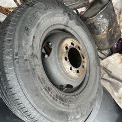 3 Different Tires Lying On My garage 