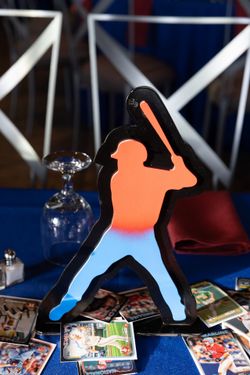 Set of 9 red & blue wood baseball player signs with built-in stands