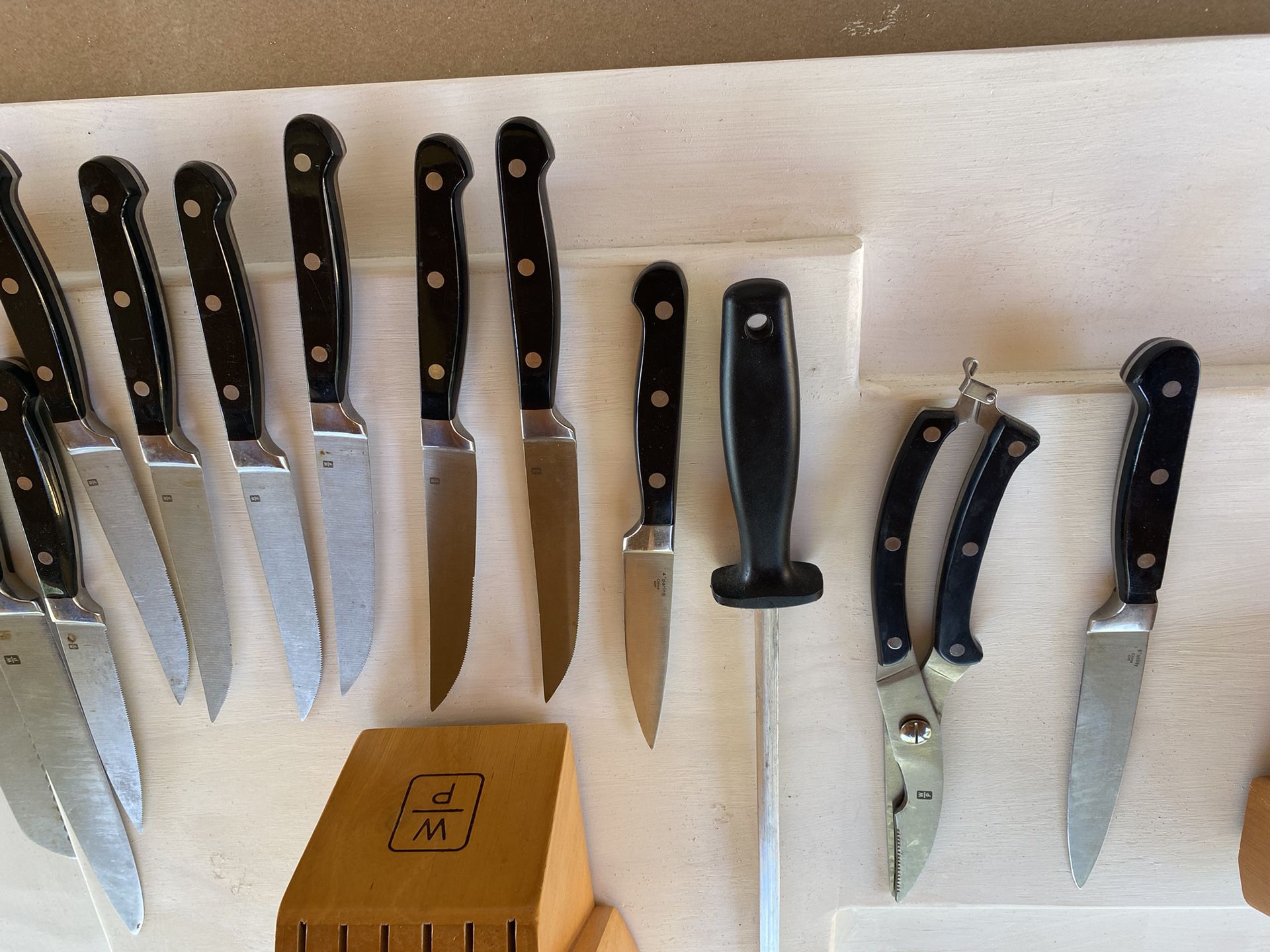 At Auction: Wolfgang Puck Knives With Block, Perforated
