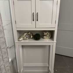 white storage bathroom over the toilet cabinet
