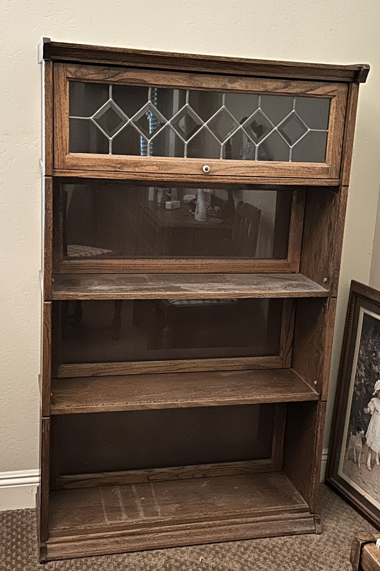 Bookcase with glass sliding doors