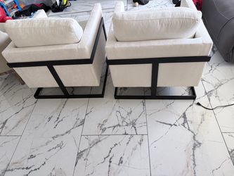 2 lounge chairs