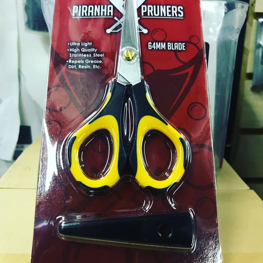 Yellow and black trimming scissor