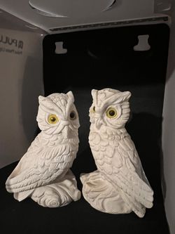 Two ceramic owl book ends
