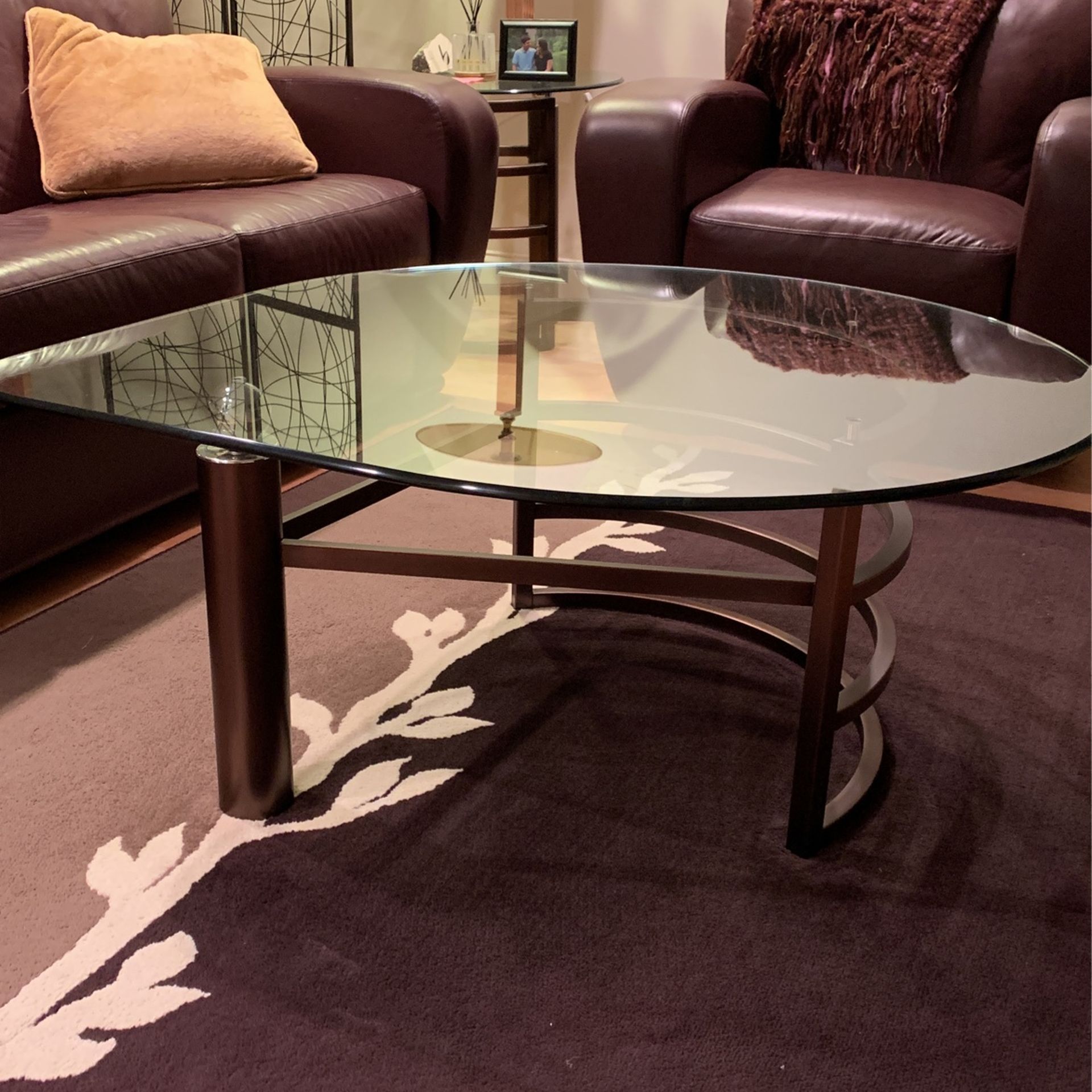Glass top coffee table with matching end table