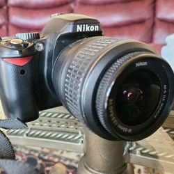 Nikon D60 Digital SLR Camera + 18-35 Lens.