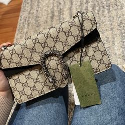 Broken Chain Gucci Dionysus GG small shoulder bag