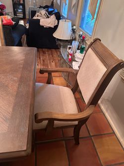 Wooden dining table with 6 chairs