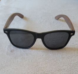 Classic-style sunglasses featuring real wood temples (arms)