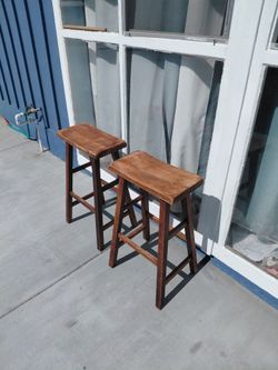 2 solid wood stools