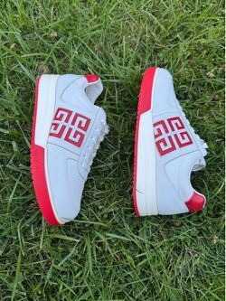 Size: EU 42 converts to a US Men's Size 9 Givenchy G4 Low-Top Sneakers