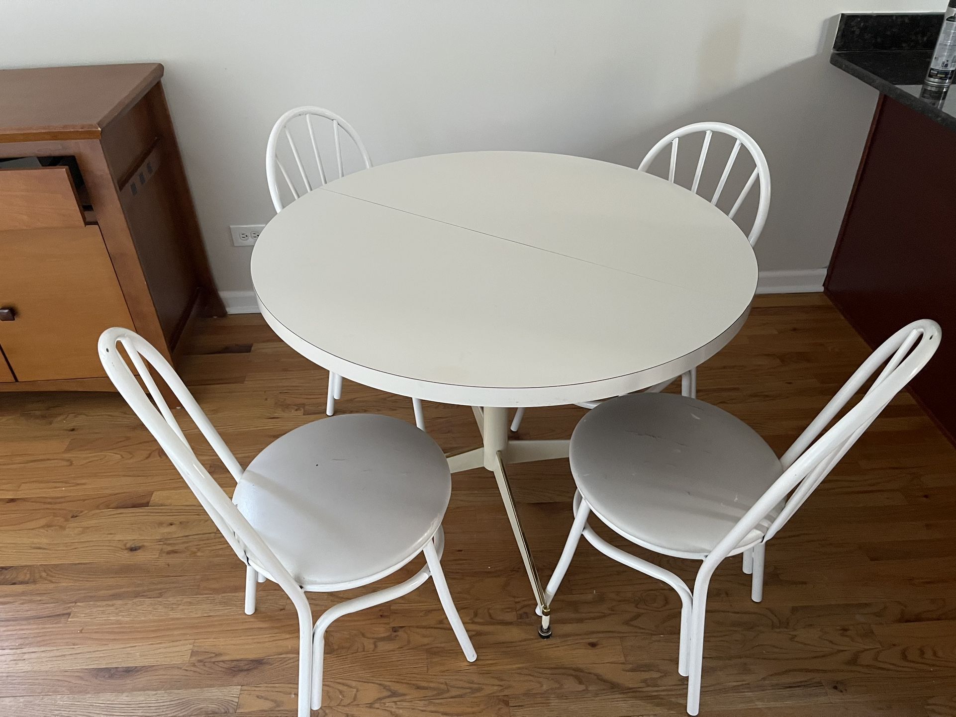 extendable table and 4 chairs