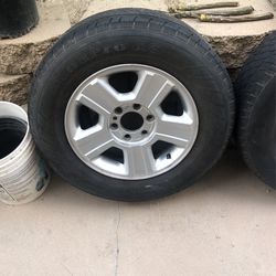 Four Tires And Rims For A Ford F-150  P245/65R17