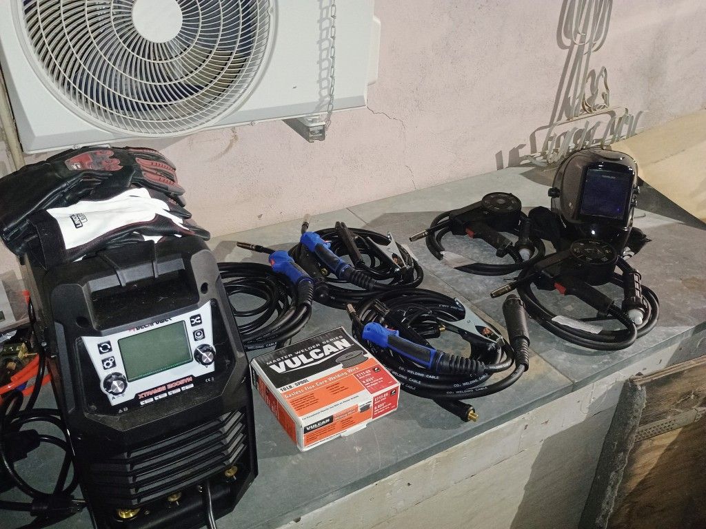 XTRAMIG-200 Multi-process MIG/MAG/MMA/TIG Synergic Welder and Cut-65K Plasma cutter with compressor.