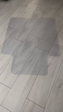 Rolling chair mat for carpet floors