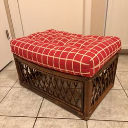 Red plaid upholstered wicker ottoman
