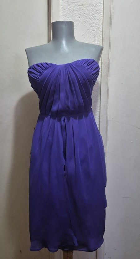 WOMAN BEBE PURPLE DRESS SIZE 0. NWT.