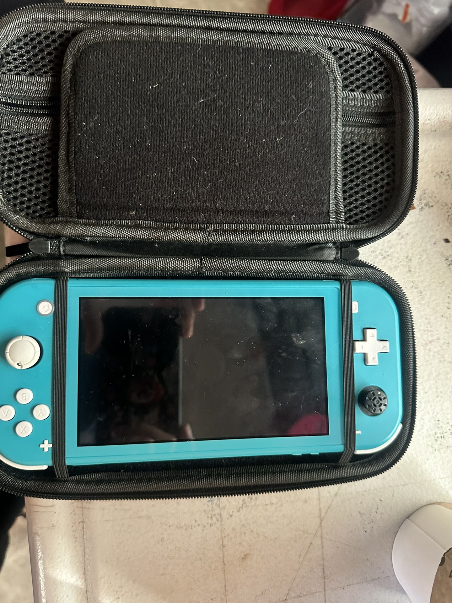 Nintendo Switch Lite With Minecraft Dungeons, Luigi’s Mansion, & Zelda